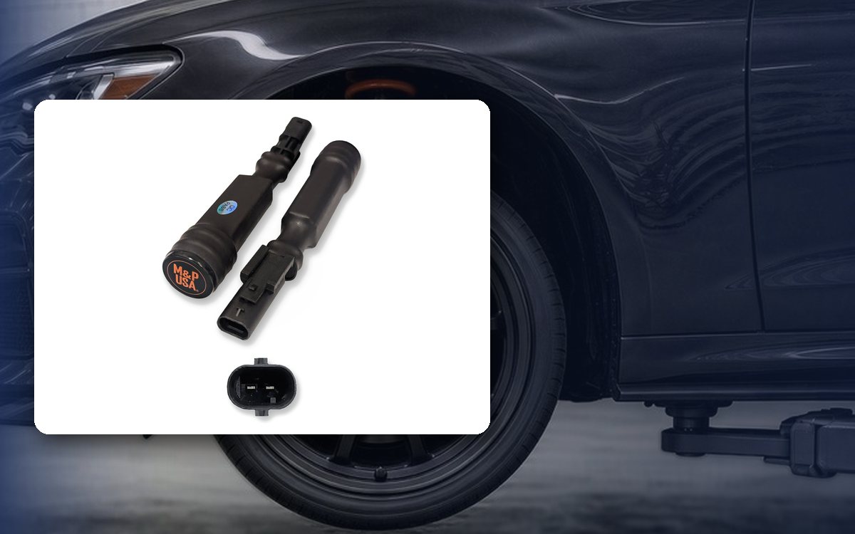 M&P USA MagneRide bypass kit for cars in front of a black sports sedan